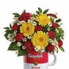 Colorful flower bouquet in Campbell’s soup mug