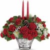 Christmas centerpiece with red flowers