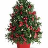 Mini boxwood holiday tree with ornaments