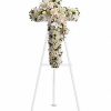 White floral cross standing arrangement