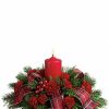 Holiday centerpiece with red and white flowers
