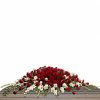 Full casket spray with red roses and white gladioli
