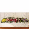 Colorful casket garland arrangement