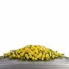 Full casket spray with yellow roses