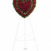 Solid heart arrangement of red roses and carnations