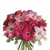 Blush pink gerbera and lily bouquet in a bubble bowl