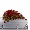 Half casket spray with red roses