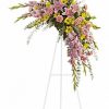 Crescent-shaped spray with pink and yellow flowers